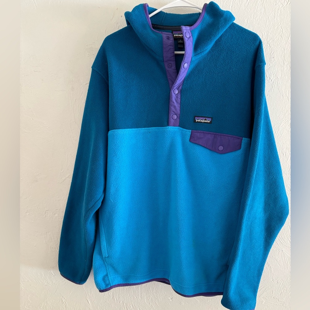 Patagonia fleece pull over with hood. Wore for a season and haven’t since.